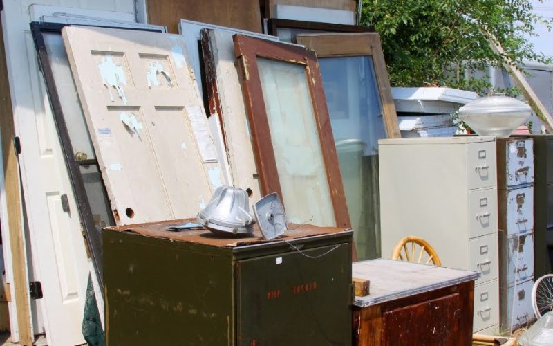 Commercial junk ready for pickup – Tampa office junk removal with discarded items prior to renovation. Office furniture hauling project with The Site Masters